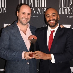 Eamon Flack and S. Shakthidharan poses with the Helpmann Award for Best Direction of a Play